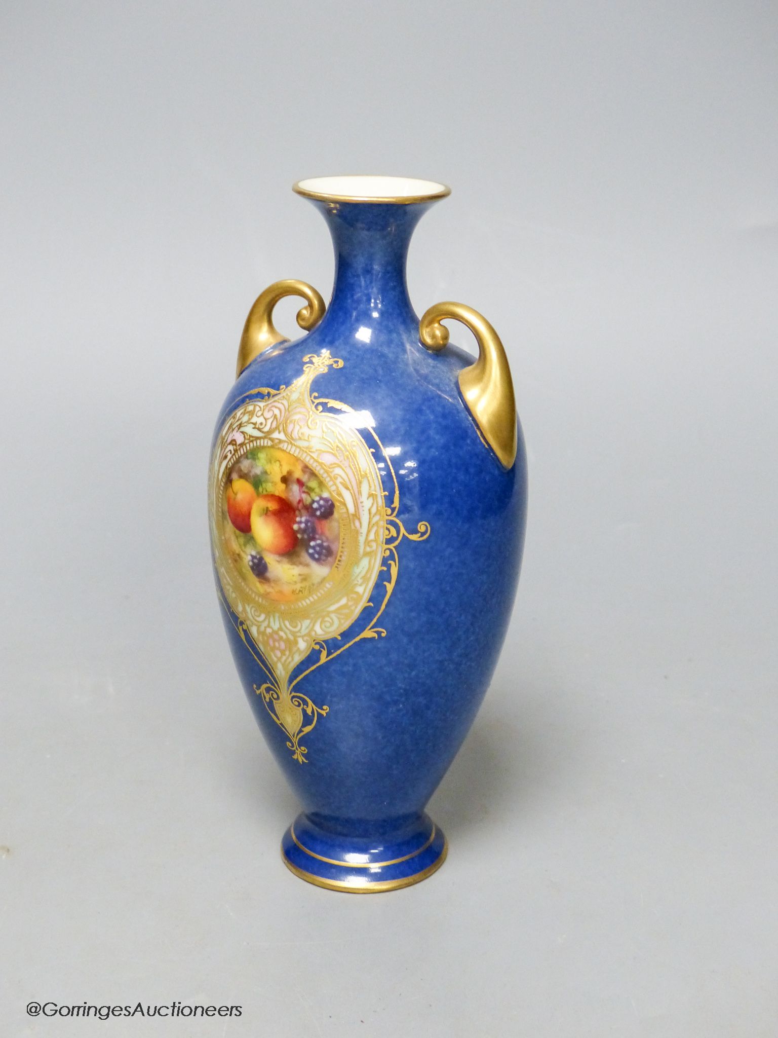 A Royal Worcester fruit painted powder blue vase, height 16.5cm